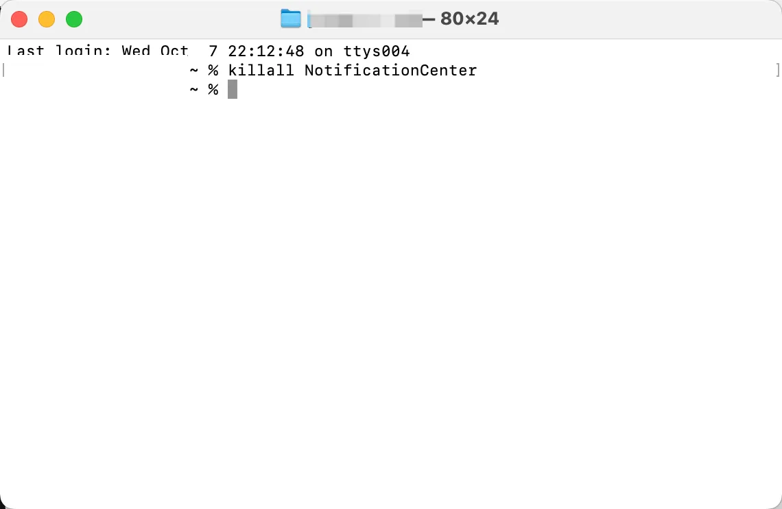 Terminal window on the MacBook Air running the one-line fix for a stuck Notification Centre: killall NotificationCenter